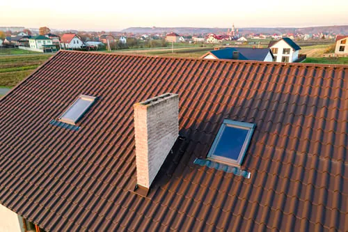 Finished tile roof on a New Mexico home at sunset